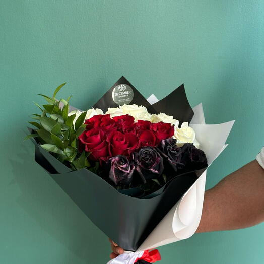 Mixed roses and ruscus