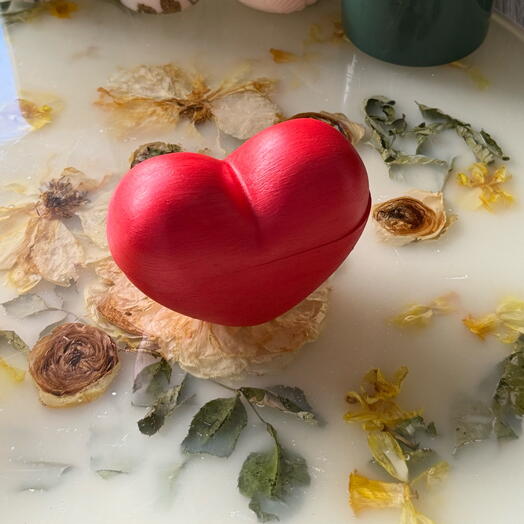 Scented candle in a handmade heart shape jar