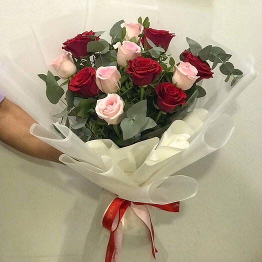 12 Stems red   white roses in a nice wrapping