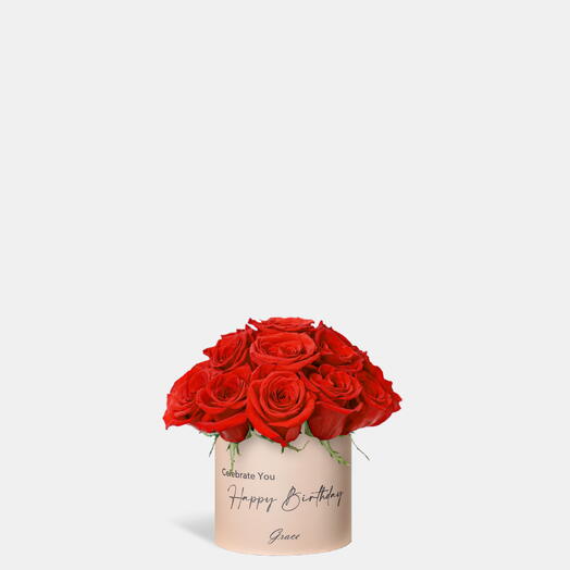 Rosas rojas alegres para cumpleaños en caja pequeña