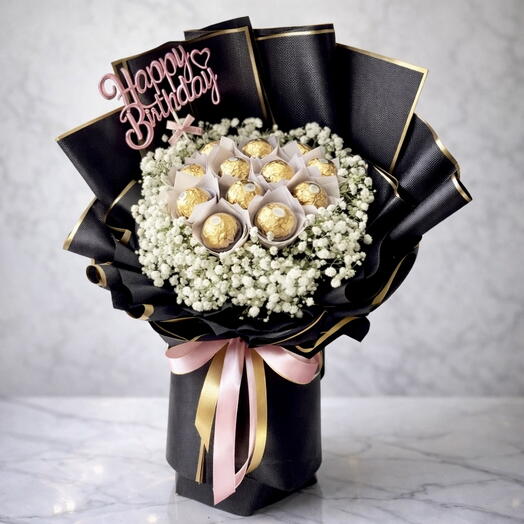 باقة عيد ميلاد فيريرو روشيه مع جيبسوفيلا – 11 قطعة شوكولاتة في تغليف أسود أنيق