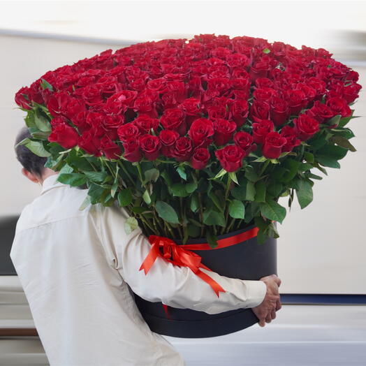 Roses rouges dans une boîte en cuir de luxe