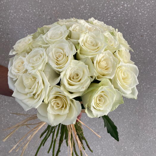 Hand bunch of white roses