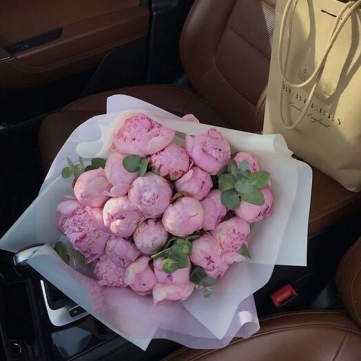 Bouquet of pink peonies and eucalypt