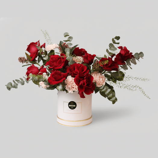 Sweet Wild Bloom Flower Bouquet – Red Roses, Pink Carnations   Skimmia in White Box (Delivery in UAE)
