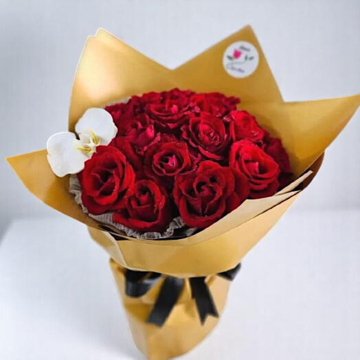 Red roses and an orchid