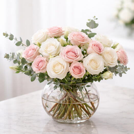 Pink and White Rose in fish bowl