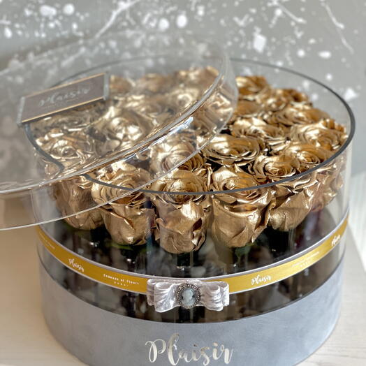 Rosas preservadas doradas en caja acrílica