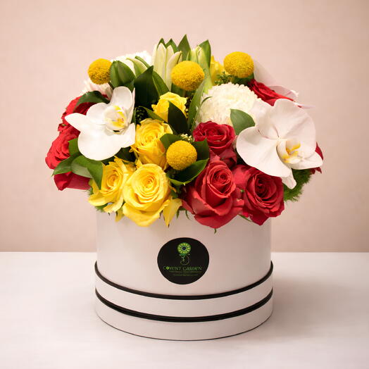Loyal Box Magic: Dark Pink and Yellow Roses, White Orchid, Caspia, Casablanca Lilies Flower Arrangement