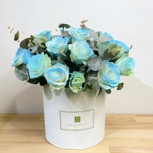 Blue Ignition – 15 Blue Roses with Eucalyptus in a Medium Round Box