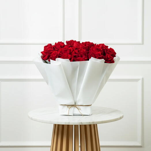 Heroine – 25 red roses in white wrapmm