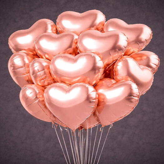 مجموعة من 21 بالونًا من رقائق معدنية على شكل قلب باللون الذهبي الوردي
