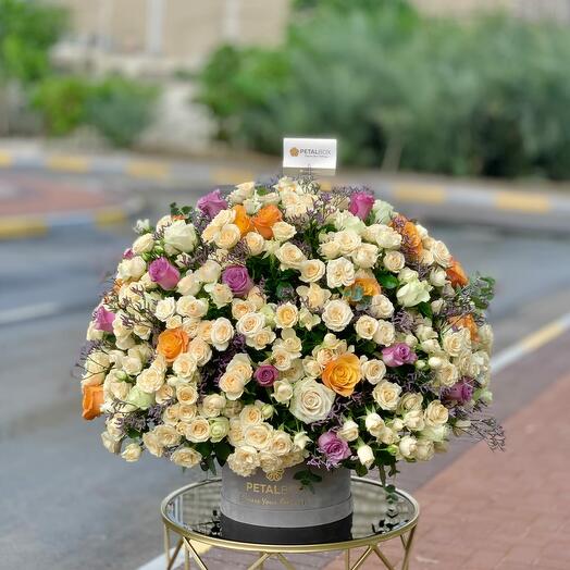 Peach Spray Roses, Purple Roses and Orange Roses  in a box