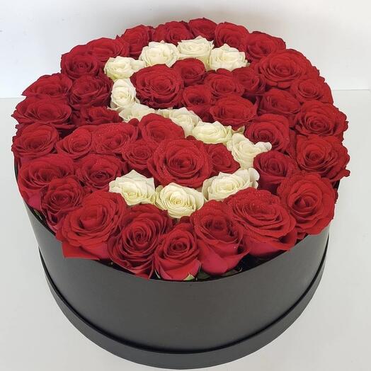Red and white roses in a box