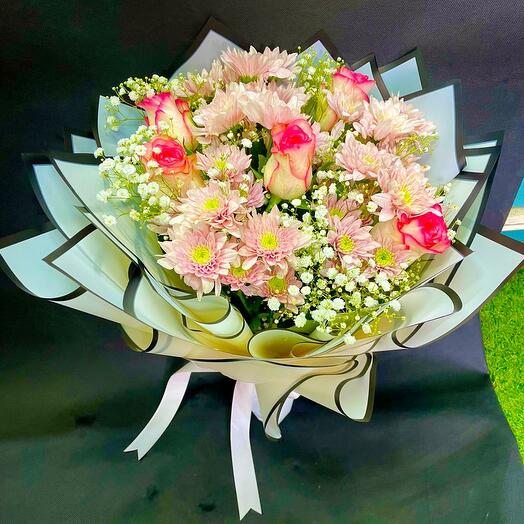 Chrysanthemums and pink rose bouquet