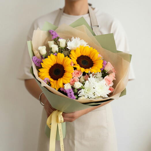 Bouquet de tournesols et de chrysanthèmes en fleurs
