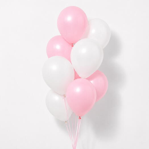 Ensemble de ballons à l'hélium rose pâle et blancs