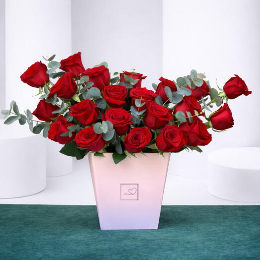 Boîte de roses liées par l'amour