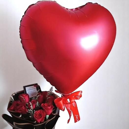 Red roses bouquet with balloon