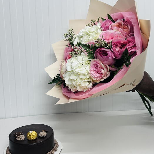 Chocolate cake and flowers combu
