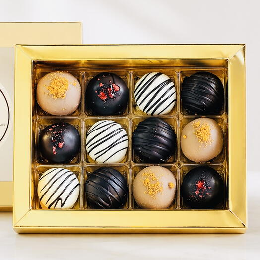 Caja de bombas de brownie dorado