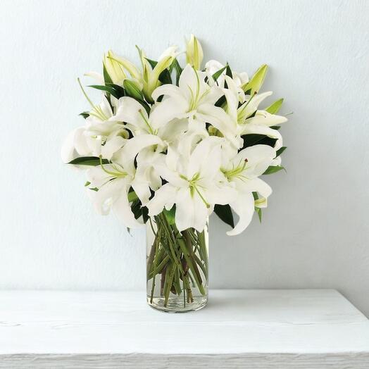 Celestial Bloom | 10 White Lilies in Glass Vase for Purity   Elegance | Same-Day Dubai Delivery