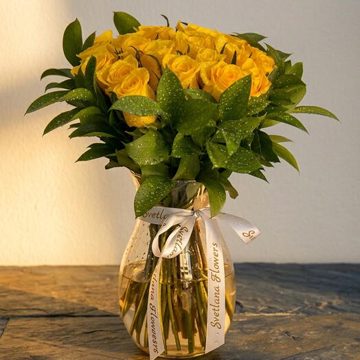 Send Sunshine 21 Yellow Roses in a Crystal Vase, Same Day Dubai