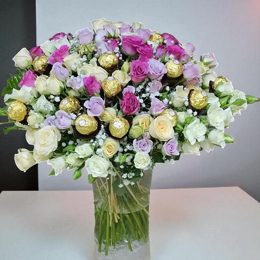 Truly Magical Combo:40 Stems of mix  Spray Roses   Ferrero Rocher Chocolate Sticks in a vase