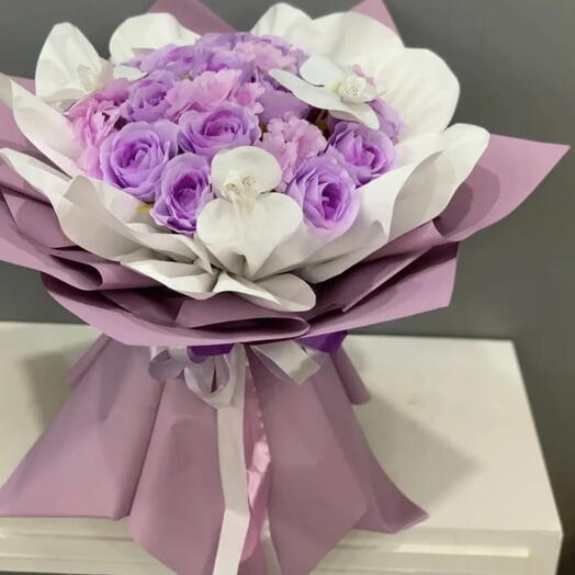 Amethyst Orchidthe deep purple color of the amethyst gemstone and The white orchid accents