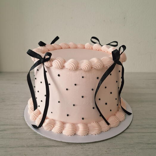 Black amd pink Bows cake