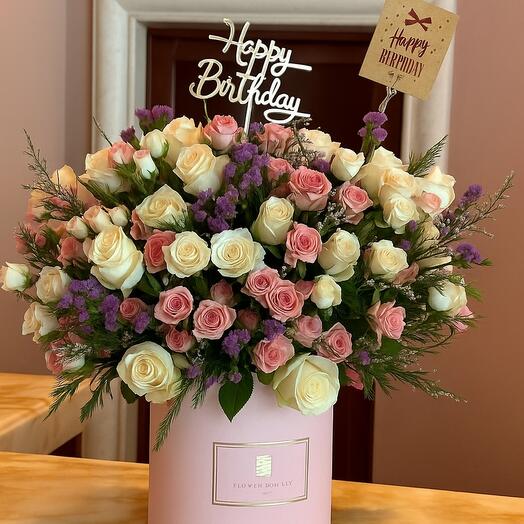 Roses pastel premium dans une boîte