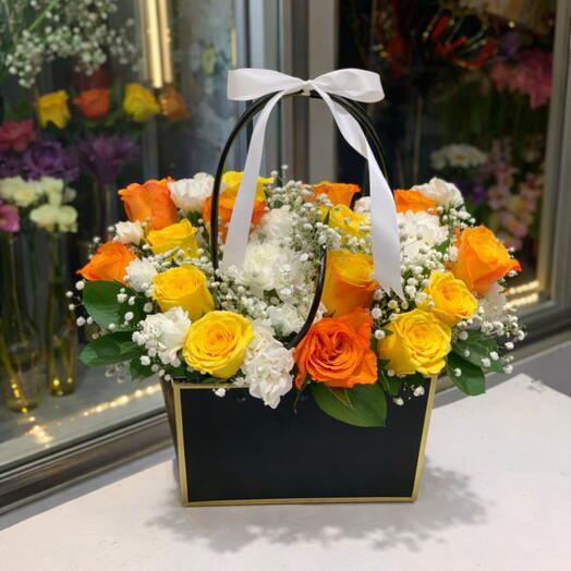Bolsa de regalo con flor naranja
