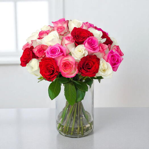 1 jarrón de vidrio con 43 rosas