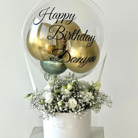 Boîte d'anniversaire avec ballon bobo