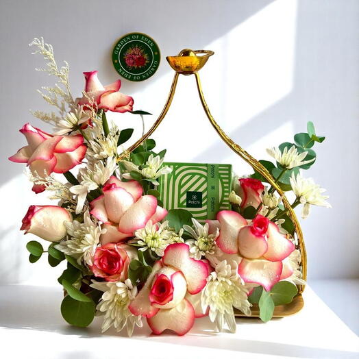 "Golden Bloom Delight | Pink Roses, Chrysanthemums   Patchi Chocolates in Luxury Stand – Premium Ramadan Gift"