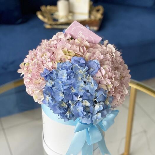Mixed hydrangea bouquet in a hat box