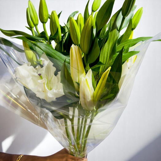 Букет чистых белых лилий – классическая элегантность в каждом цветке