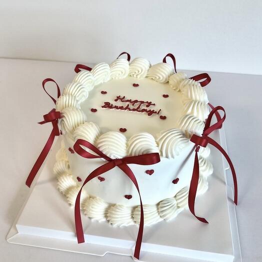 Pastel de cumpleaños con lazo