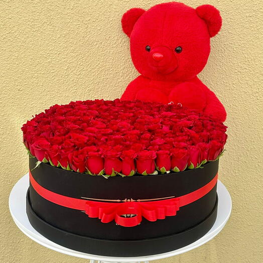 Red roses with teddy bear