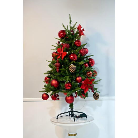 Artificial Christmas Tree Decorated in Red