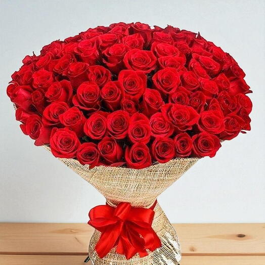 RED ROSES IN A JUT WARPPING BQT