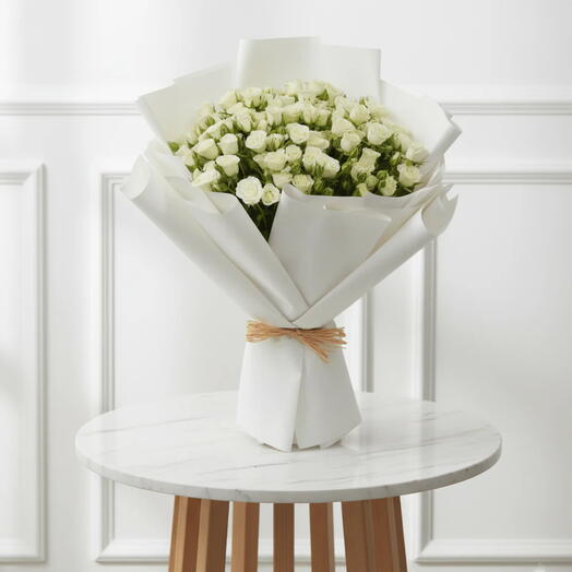 Fearless – 69 white spray roses in white wrap | luxury white bouquet | anniversary flowers | elegant gift | premium bouquet