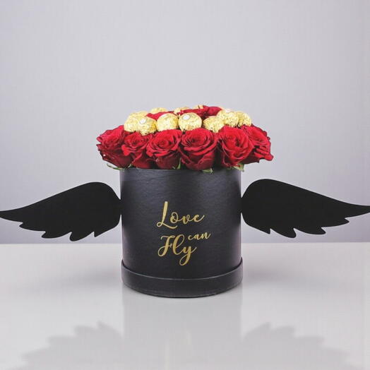 Красные розы с топпингом Ferrero в стильной черной коробке
