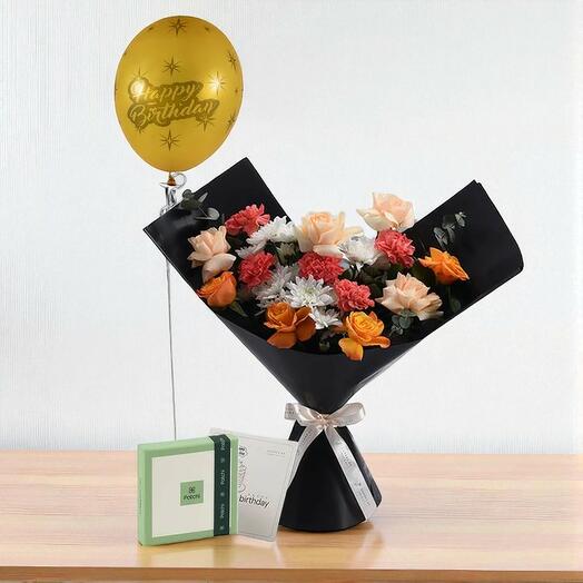 Букет на день рождения «Цитрусовый взрыв» с шоколадным шариком «Пачи» – яркий цветочный подарочный набор