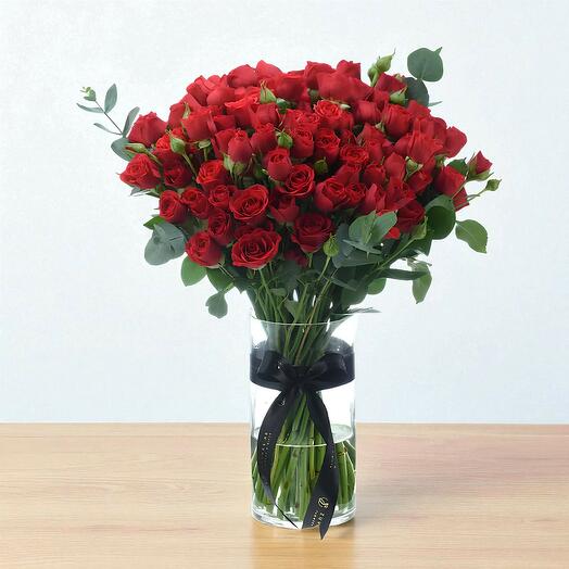 The Majestic 25 Red Spray Roses in vase