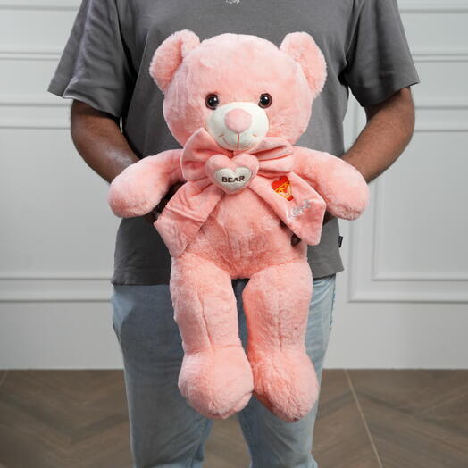 Мягкий розовый плюшевый мишка с бантом 7485