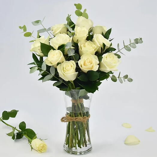 12 white ros with vase