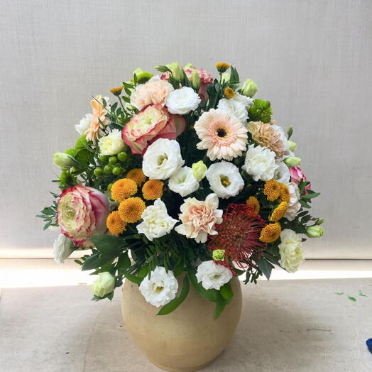 Vase mix glowflowers arrangement