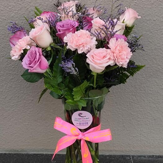 Pastel Wishes; Roses and Carnations in a vase