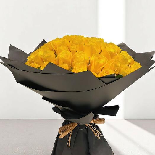 101 yellow rose bouquet with black wrapping